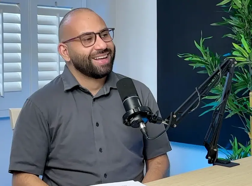 Mateen smiling during a recording